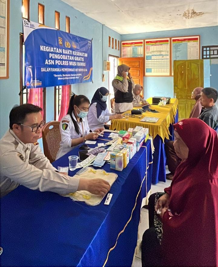 ASN Polres Musi Rawas Hadir Ditengah Masyarakat Gelar Pengobatan Gratis di Desa Pedang, Rangka HUT Korpri Ke -54